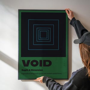 May include: A framed art print with a black and green design. The artwork features a series of nested blue squares against a black background. The word "VOID" is printed in bold white letters, with the text "Depth & Dimension" and an explanatory sentence below.