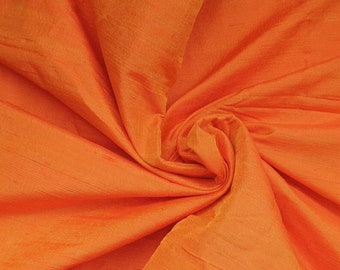 One yard  of 100 per cent pure dupioni in  orange/raw silk /silk fabric