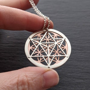 Handcrafted Star Tetrahedron and Flower of Life Pendant - silver and copper.