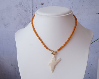 Light Brown Oval Beaded Necklace with Bone Flying Bird