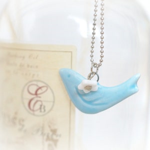 Pale Blue Ceramic Dove with White Flower Necklace