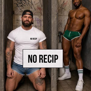 May include: Two men in a public restroom. One man is kneeling, wearing a white t-shirt with "NO RECIP" printed on it, denim shorts, and a black cap. The other man is standing, wearing green shorts with white trim, white socks, and white trainers.