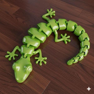 May include: A bright green articulated lizard toy with a segmented body, four-legged limbs, and a head. The toy is made of glossy plastic and rests on a dark wood-grain surface. The lizard's body is curved, and its limbs are spread out.