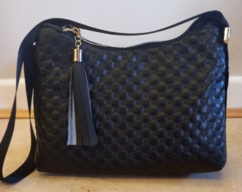 black vinyl shoulder bag