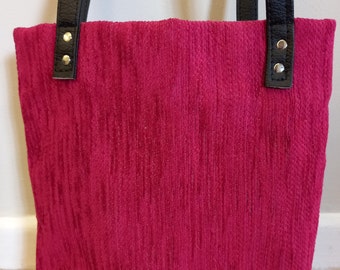 Pink and black shoulder bag