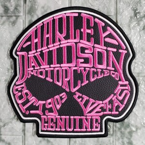 pink Willie G Skull patch set for female motorcyclists, designed to be sewn onto the back of a jacket.