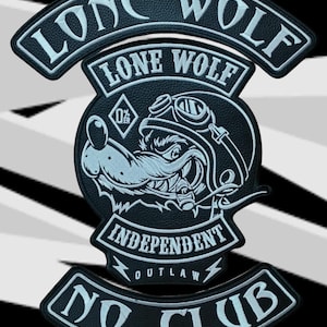 May include: Black and white Lone Wolf patch with the text "Lone Wolf", "Independent Outlaw", and "No Club". The patch features a wolf wearing goggles and a helmet. The background is black, white, and orange.