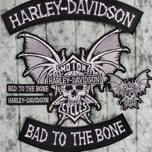 Embroidered patches for motorcyclists: bat, "bad to the bone"; for jackets (back and front).