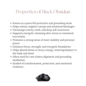 May include: A white informational card titled Properties of Black Obsidian, listing nine bullet points about the stone's attributes, including protection, grounding, and clarity. A single, small, irregular, glossy black obsidian stone is below.