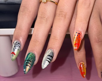 Unghie finte per esche da pesca