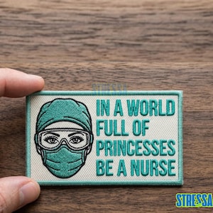 May include: A handmade, wooden serving tray with a natural finish. The tray features a rectangular shape with raised edges and integrated handles. The wood grain is visible, showcasing the tray's rustic charm. Dimensions are approximately 16 inches long, 10 inches wide, and 2 inches high.