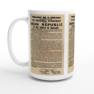 May include: White ceramic mug printed with the text of the Irish Proclamation of Independence. The text is in black on a cream background. The mug has a standard handle and a glossy finish, ideal for tea or coffee.