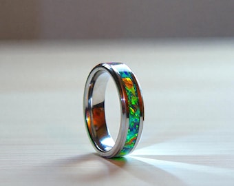 Anillo Prismforge – Fusión de meteorito con esmeralda, ópalo y nanodiamante