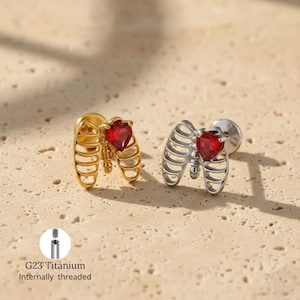 Vivienne westwood skeleton earrings - Etsy 日本