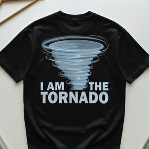 May include: A set of three ceramic mugs with a speckled, matte finish. Each mug features a different color: light blue, cream, and gray. The mugs have a simple, modern design and a comfortable handle.