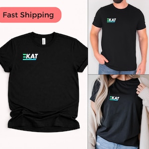 May include: A set of three ceramic mugs with a speckled, matte finish. The mugs are in shades of cream, light gray, and dark gray. Each mug has a simple, minimalist design, perfect for coffee or tea.