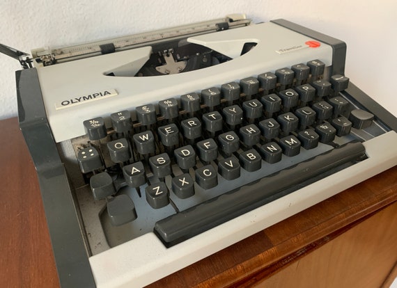 Vintage typewriter | Olympia Traveller | portable | sixties | manual | QWERTY | Made in West Germany