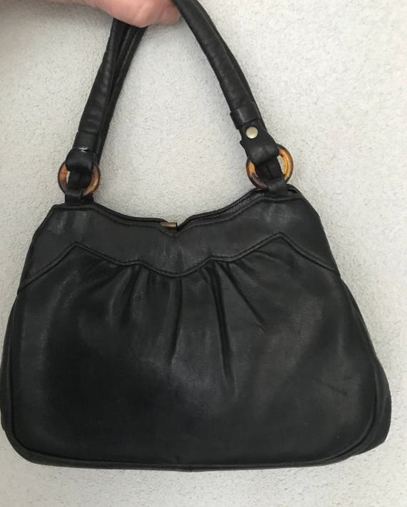 Vintage black leather fifties handbag, tophandle bag with lucite detail