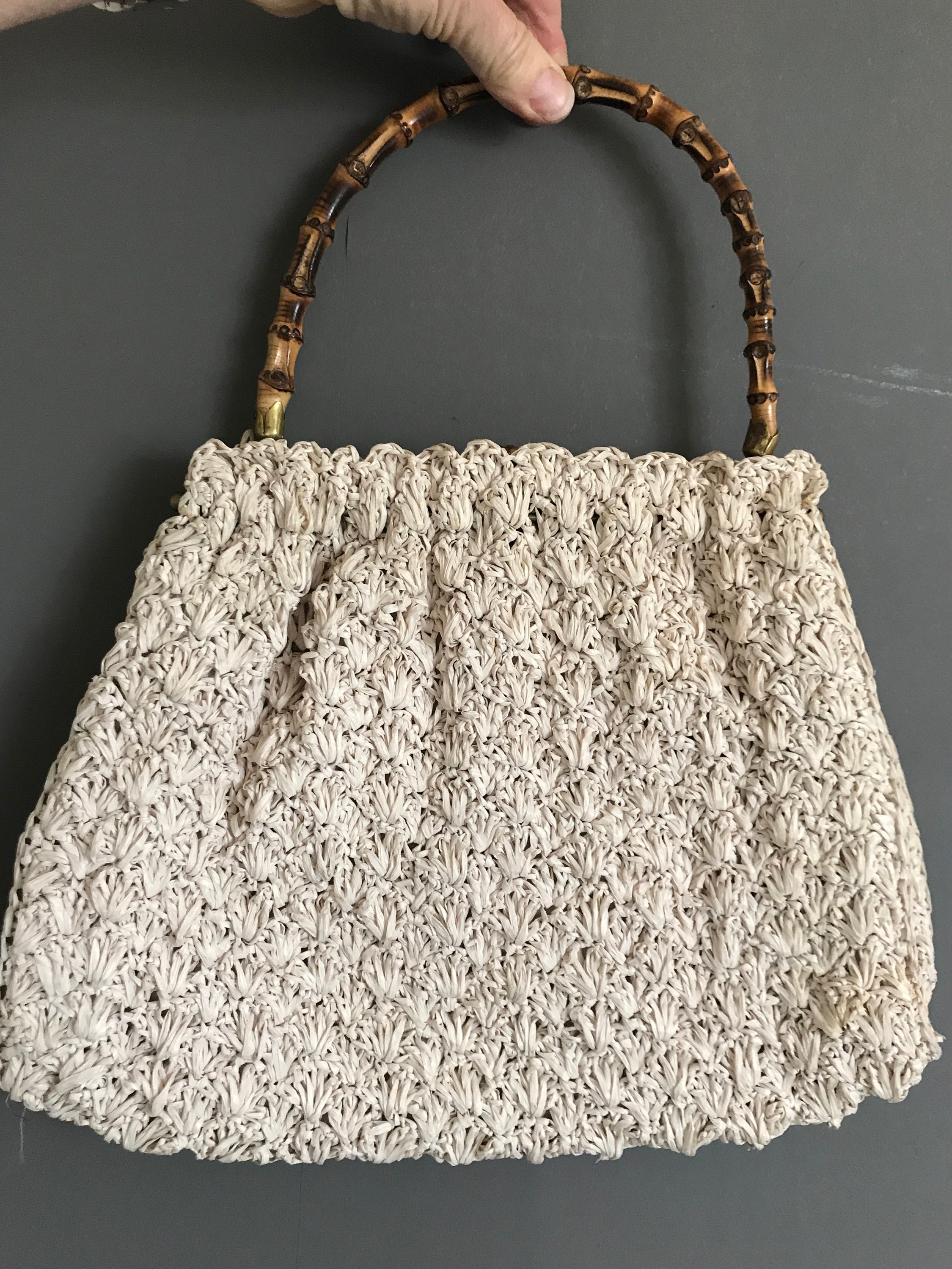 top handle beige bag