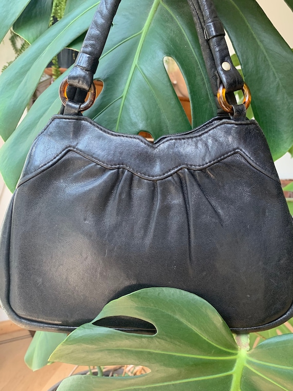 Vintage handbag | fifties purse | black leather | by Karim | bag | top handle | fifties | lucite buckles