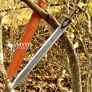 May include: A silver sword with a brown handle and a brown sheath. The sword has a decorative design on the blade and a shield-shaped emblem on the hilt. The sheath is made of leather and is attached to the sword.