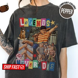 May include: A white ceramic mug with a black handle and the text "But First, Coffee" in a bold, black font. The mug is set against a neutral background, highlighting its simple design.