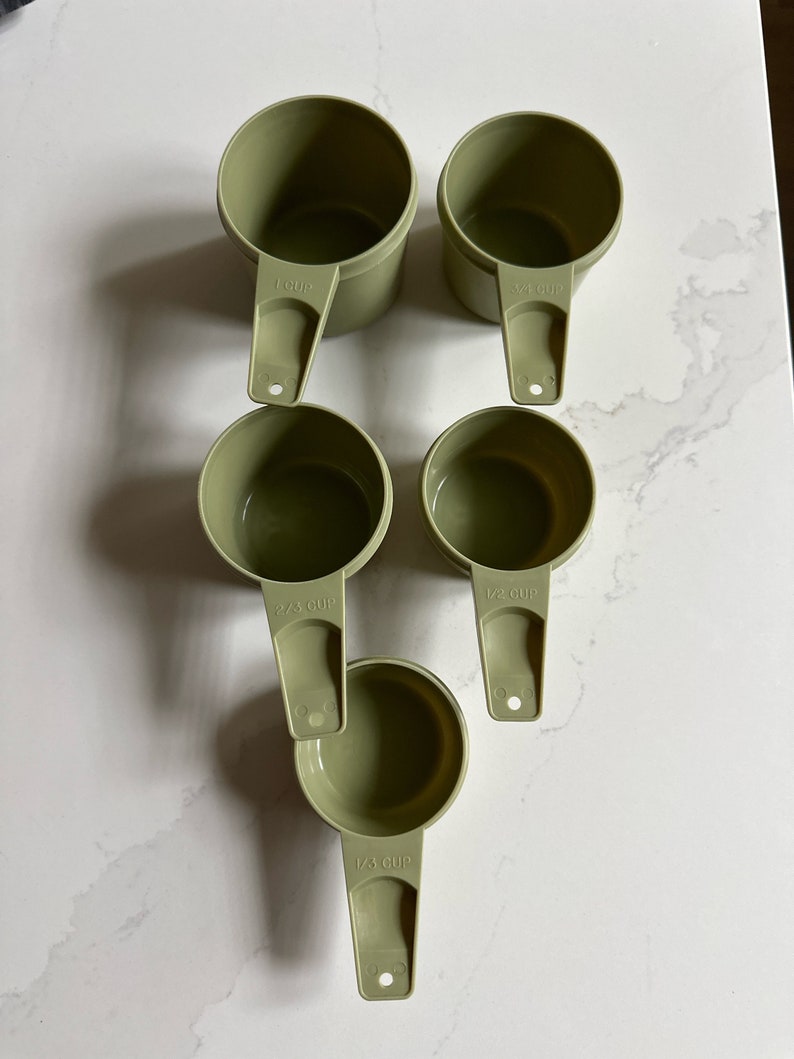 Vintage and Collectible Set of Green Tupperware Measuring Cups