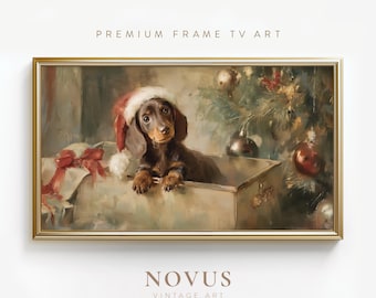 May include: A framed painting of a dachshund puppy wearing a Santa hat, sitting in a box. The painting has a vintage style with Christmas ornaments and a red bow in the background. The text "PREMIUM FRAME TV ART" is at the top.