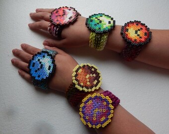 Retro pixel art crochet bracelets cuffs. Perler art watches