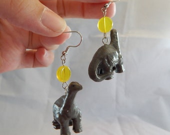 Apatosaurus mokele mobembe dinosaur upcycled toy earrings