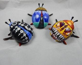 Miniature painted beetles. Upcycled artistic toys.