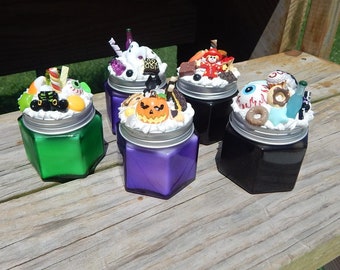 Decoden Halloween ditty jars with candles inside.