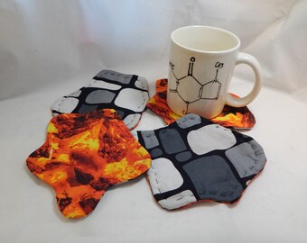 Halloween fabric coasters, reversible cotton hand-quilted set of four, Lava and retro rocks. Splat shaped!