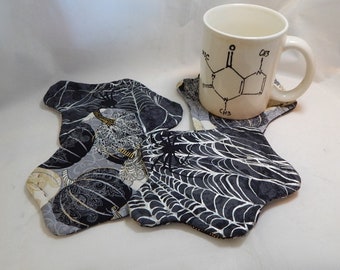 Halloween fabric coasters, reversible cotton hand-quilted set of four, Gold filligree pumpkins and silver spiderwebs. Splat shaped!