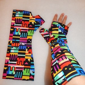 Fingerless rainbow abstract rave unisex festival gloves for dance or cosplay. Glam rocker style, X-Large size for drag show gear