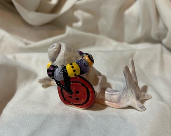 The button thief snail OOAK hand-built ceramic figurine snails