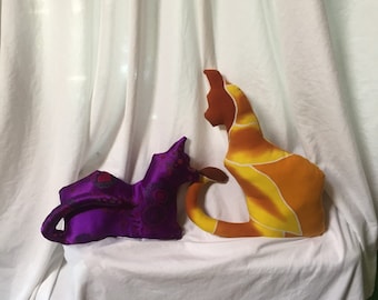 Cat silhouette pillows from upcycled shirts. Slick purple oriental or soft orange batik