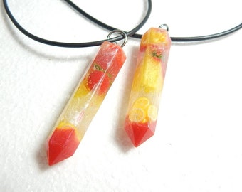 Strawberry lemonade resin crystal pendant.