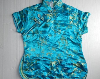 Mandarin collar, embroidered shirt in blue and gold. Size L