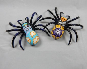 Upcycled spider toys with mandala and kumo designs. Mini paintings.