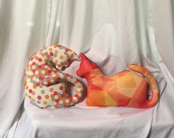 Cat silhouette pillows from upcycled shirts. Geometric prints hexagons and prisms