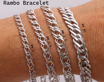 May include: Four 925 Sterling Silver Rambo bracelets with flat curb links, displayed in varying widths of 5 mm, 6.5 mm, 7.7 mm, and 10 mm. The silver chains feature a polished finish and are arranged side by side to show the scale of each link size.