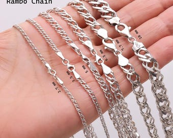 May include: A collection of 925 sterling silver Rambo chains in varying widths, labeled 2.7 mm, 3.5 mm, 5 mm, 6.5 mm, 7.7 mm, and 10 mm. Each chain features a polished metallic finish and a secure lobster claw clasp, with the largest chain marked ITALY.