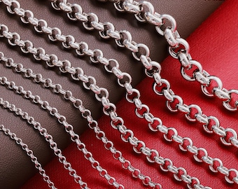 May include: A collection of 925 Sterling Silver Rolo Belcher chains displayed in varying thicknesses, ranging from fine to heavy links. The metallic silver chains feature rounded, interlocking circular links with a polished finish.