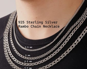 May include: A 925 sterling silver Rambo chain necklace shown in four different widths: 3.5 mm, 5 mm, 6.5 mm, and 7.7 mm. The silver chains feature a repeating interlocking link pattern and are displayed against a black shirt.