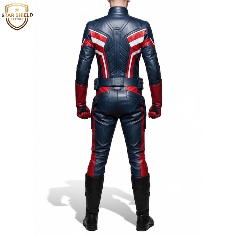 May include: A navy blue and red leather costume with white accents, featuring a jacket and pants. The costume includes a belt, gloves, and boots. The Star Shield Leather logo is visible in the upper left corner.