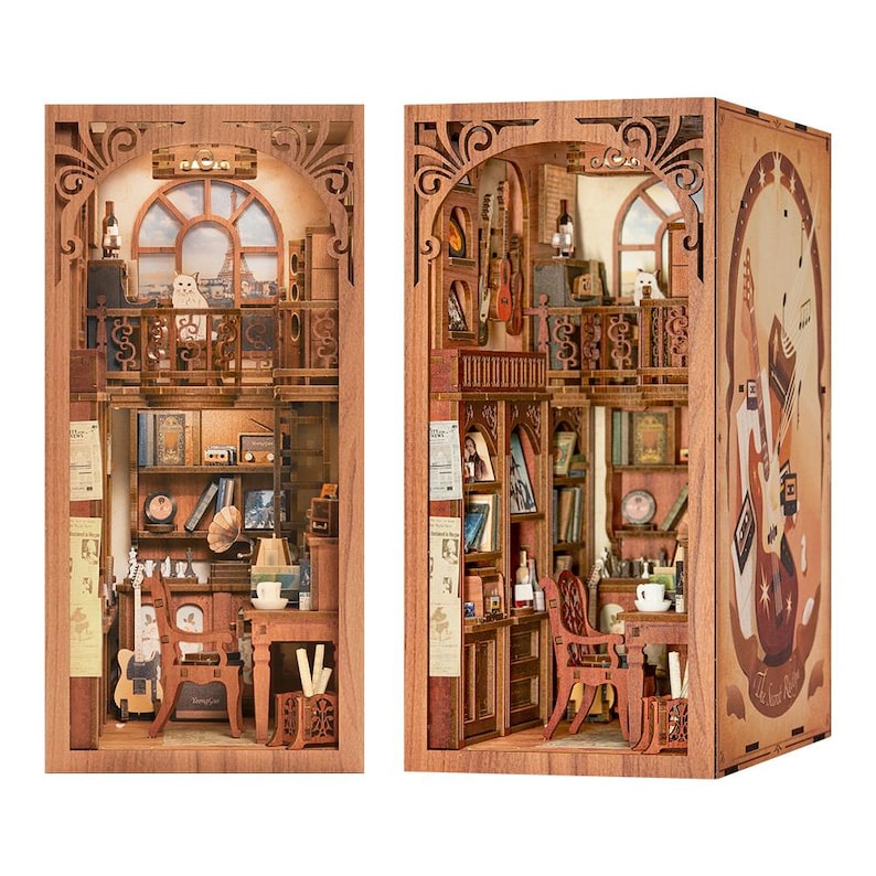 May include: Wooden bookshelf model with intricate details, featuring a miniature room with a desk, chair, books, and a guitar. The model has a warm, brown color and includes a small cat figurine on a balcony.