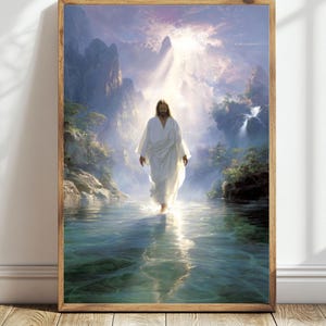 May include: A framed print depicts a figure in a white robe walking on water, with a bright light shining from above. The background features mountains, waterfalls, and lush greenery. The frame is made of light brown wood.