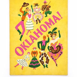 May include: A vintage poster with a yellow background and the word "OKLAHOMA!" in pink. The poster features stylized illustrations of people in colorful costumes, suggesting a musical or theatrical theme.