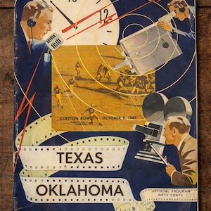 May include: A set of three ceramic mugs with a speckled, matte finish. The mugs are in shades of cream, light gray, and dark gray. Each mug has a simple, minimalist design and a rounded handle. The mugs are stacked on top of each other.